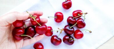 Handful of cherries on a napkin