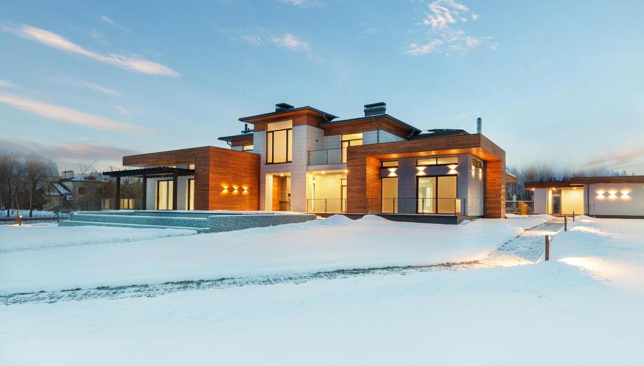 modern upscale house in the snow